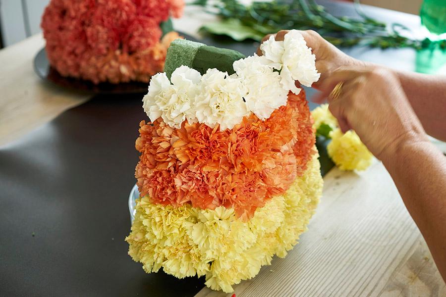 candy corn decorations with White Carnations Candy Corn Arrangement