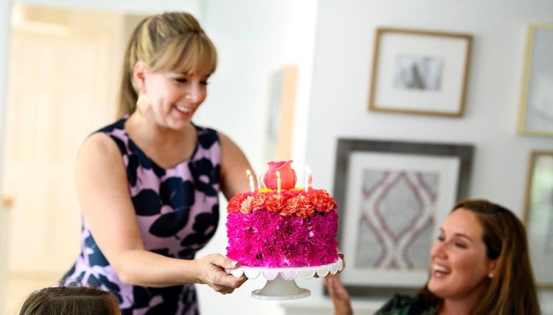 Photo of flower birthday cake, a component of the dinner party theme
